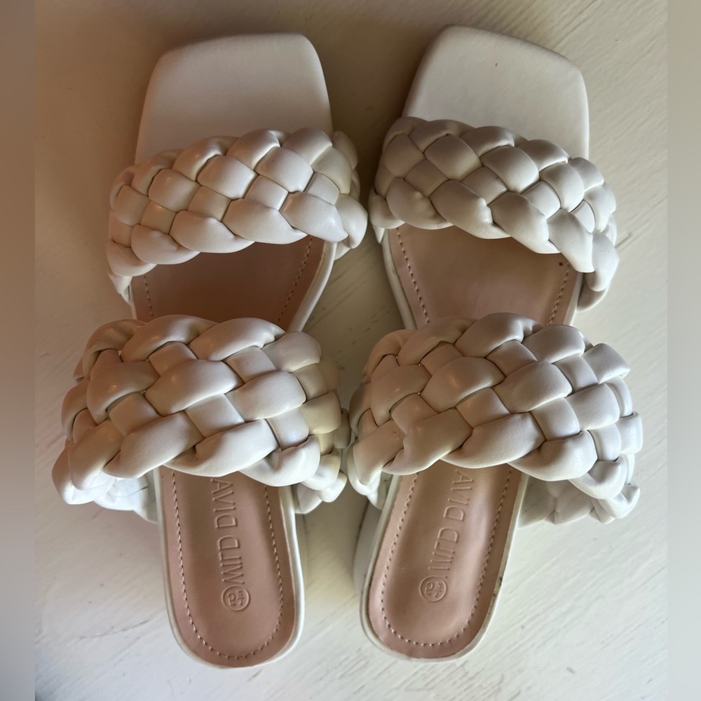 Brand new, never worn white sandals with small heel.